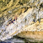 Basia Debowska in Helihopter v omaki (8b) in the big cave of Osp@photo by Lukasz Debowski